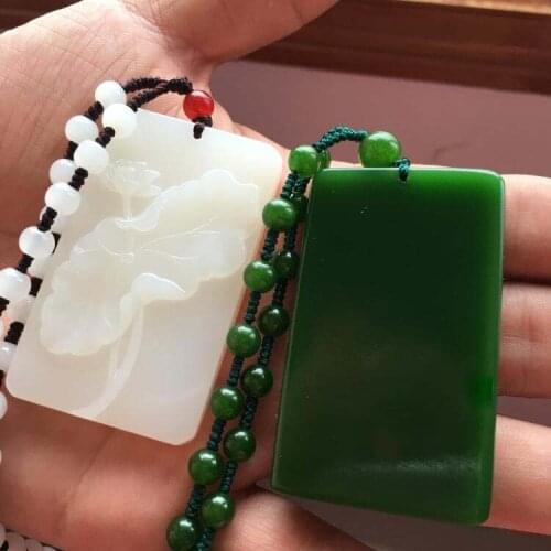 Xinjiang Hetian jade carved jade lotus jade spinach green brand of men and women clean Qinglian Pendant