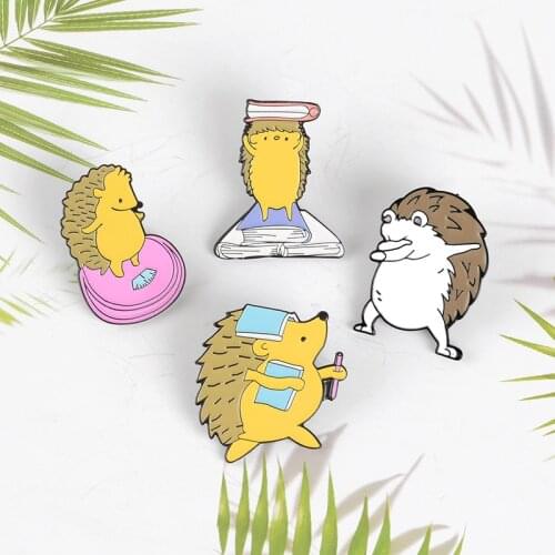 Cartoon hedgehog cute animal badge Hedgehog learning to read books Electronic scale movement Metal brooch Gift for children