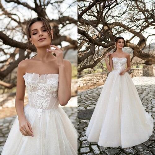 2021 Wedding Dresses Sexy Strapless Lace Appliques Beach Bridal Gowns Custom Made Sweep Train A Line Wedding Dress