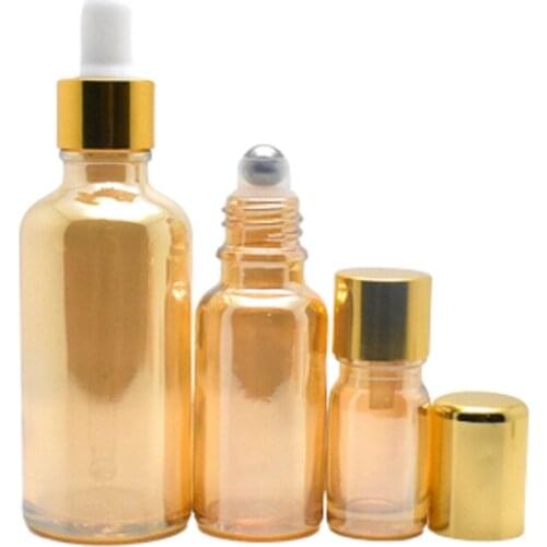 Amber Gold Glass Roll on Aroma Packaging Bottle Vial Cosmetics Roller Toner Dropper Bottle Gold Cap Essential Oil Bottles