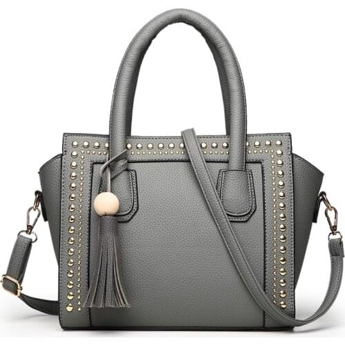 The New Shell-shaped Portable Handbags Korean Fashion Rivets Shoulder Messenger Tassel Bag Handbags Shoulder