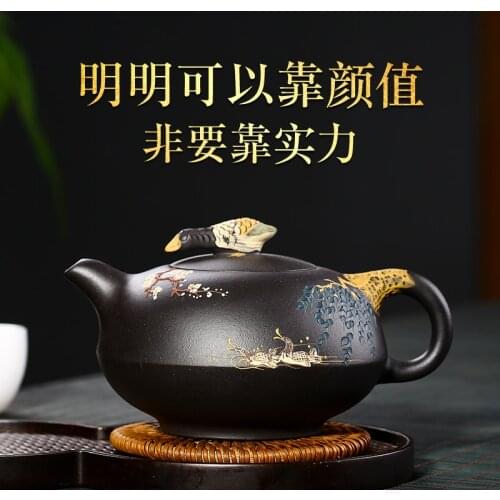 Yixing recommended pure manual undressed ore black clay pot famous Yuan Youjun mandarin duck play blisters teapot