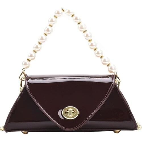 Womens lacquered small bag 2021 new pearl hand-held small square bag fashion chain one-shoulder trend slanted womens bag