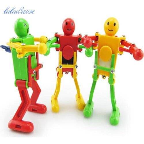 3pcs/lot plastic wind up toy Dancing robot For Baby Kids educational toy Puzzle Toys Clockwork Dancing Robot