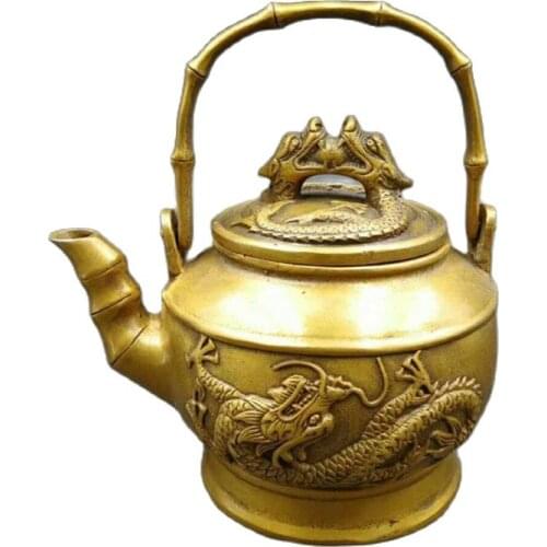 The private collection of old brass bronze copper teapot teapot handle two pot