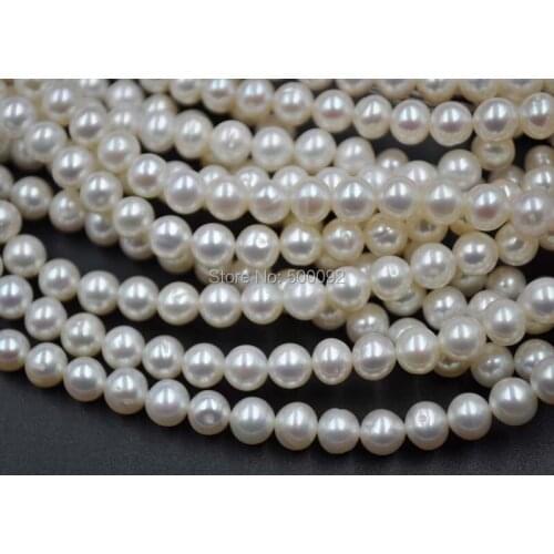 GOURGEOUS 10 STRANDS 6MM NEAR ROUND FRESHWATER PEARL