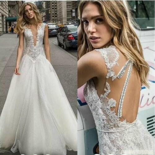 Netta BenShabu Collection Wedding Dresses Deep V Neck Lace Appliques Beaded Beach Bridal Gown Backless Bohemian Vestido De Noiva