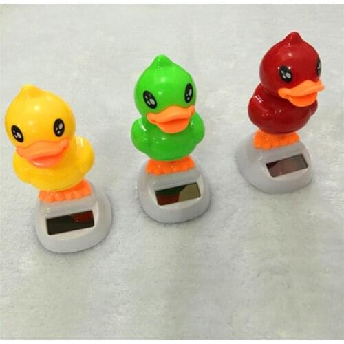 Plastic decor Shaking His Head Rhubarb Duck Car Interior Decorator Decoration Solar Energy Automatic Swing Sun Flower Unisex