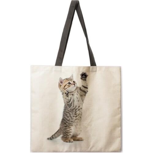 High quality and brand new 100% Type: handbag/shopping bag Main color: as shown Material: linen blend Shape: square Size: 4