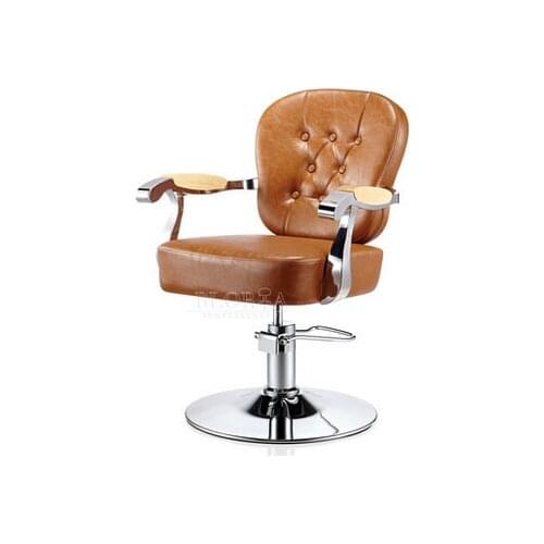 Luxury european-style hairdressing chair. Retro hairdressing chair. Special hair salons haircut chair
