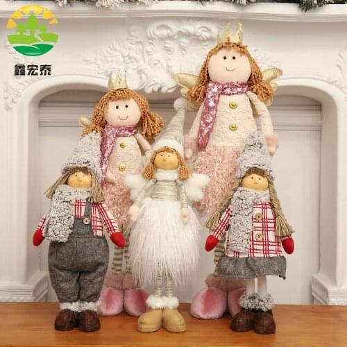 Pink and white Christmas decoration scene decorated angels cute dolls dolls children girls presents Christmas decorations