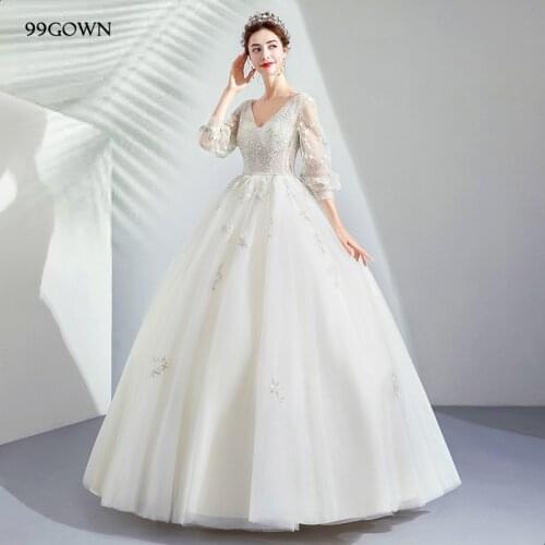 99GOWN 2021 Women Simple Wedding Dress Three Quarter Lantern Sleeve V-Neck Backless A-Line Beading Satin Tulle Bridal Dress