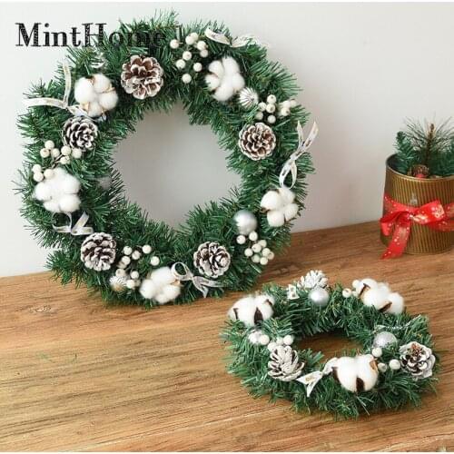 The new Christmas wreath rattan ring simulates the cotton pine cone door hanging hotel window arrangement Christmas decorations