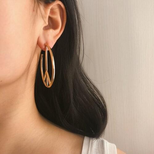 European and American simple jewelry with hollow geometric semicircle personality fan-shaped peace symbol alloy female earrings