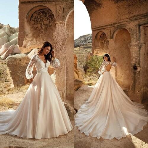 2021 Wedding Dresses V Neck Long Sleeves Appliques Lace Bridal Gowns Custom Made Hollow Back Sweep Train A Line Wedding Dress