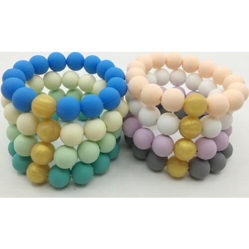 Mrs.ChewedBeads. Golden Bracelets