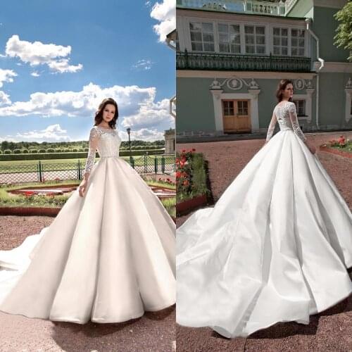 2020 Wedding Dresses O-Neck Long Sleeves Lace Appliques Bridal Gowns Button and Lace-up Back Sweep Train A Line Wedding Dress