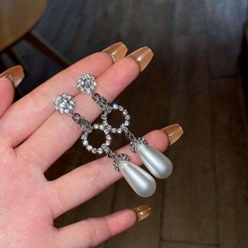 New style inlaid rhinestone pearl flower circle cold wind fashion design earrings net red temperament earrings