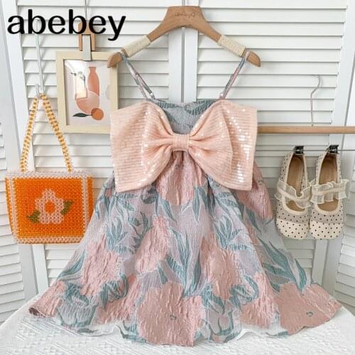Sweet sleeveless off shoulder Dress Sequin bow decoration high waist pleated print short A-line Dress 2021 New Summer