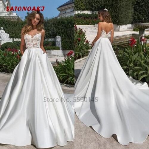 Simple Design A Line Satin Wedding Dress Illusion 2020 Sheer Neck Backless Bridal Gown With Pockets Long Train Vestido De Novia