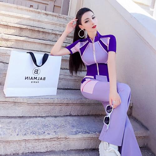 Summer leisure sports thin age reducing suit 2021 new style temperament splicing short sleeve top flared pants two piece set