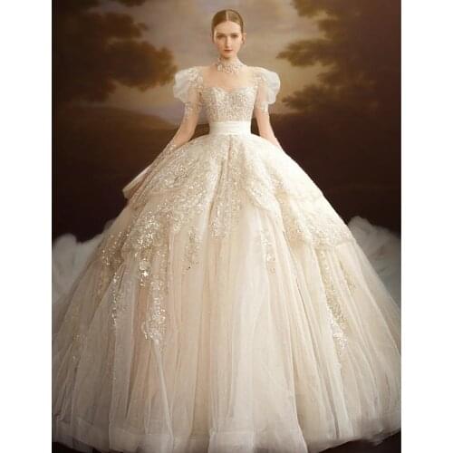 Luxury Arabic Champagne Wedding Dresses Ball Gown Long Sleeve Sequins Beaded High Neck Lace Crystals Bridal Wedding Gowns
