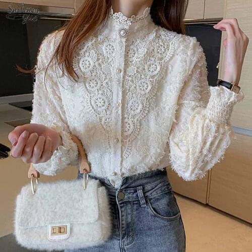 Autumn Stand Collar Tassel Stitching Lace Blouse Hollow Out Flower Womens Shirt New Loose Womens Long Sleeve Top Blusas 16556