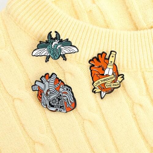 Live Through The Pain Enamel Pins Custom Organ Heart Moth Assassinate Dagger Brooch Lapel Badge Bag Punk Jewelry Gift For Friend