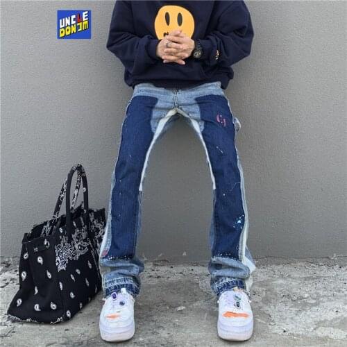 UNCLEDONJM Sticker stitched jeans men patchwork jeans mens street wear Distressed Denim jeans for men designer jeans 86112