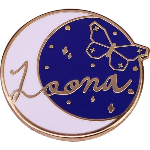 Butterfly brooch features crescent moon with blue backdrop and 12 golden stars that represent each Loona members