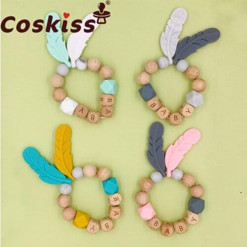 Coskiss Wooden Pacifier Chain Clip Personalized Pacifier Baby Bracelet Safety Silicone Feather Teething Chain Baby Products
