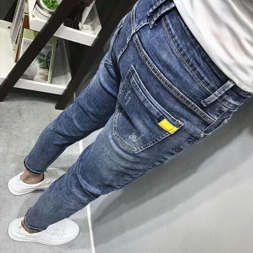 Wholesale Denim jeans mens summer Korean style slim-fitting pants casual blue stretch trend wild ankle length pencil pants men