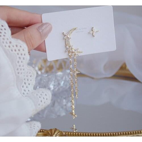 Exquisite copper inlaid zirconium asymmetrical moon tassel star 14K real gold plated womens prom party earrings Korean jewelry
