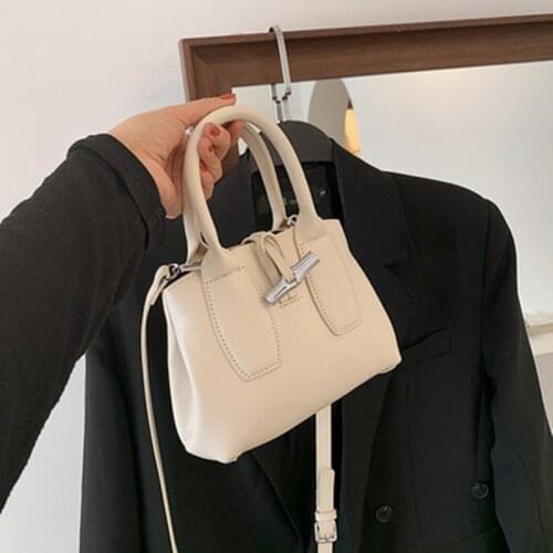 Bolso Vintage informal para mujer, bandolera con asa superior, bolso de hombro para estudiante, billetera de cuero, novedad de