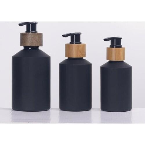 Beauty personal care cosmetics bamboo lotion pump cap mist hair shampoo black matte bottle 60ml 100ml frosted glass spray bottle