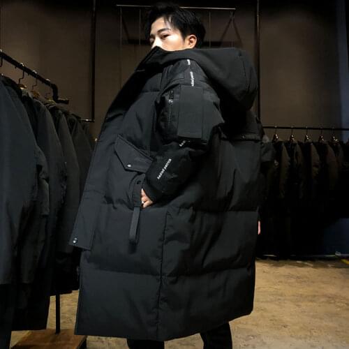 The new over-the-knee pie overcomes the thickening of the long mens winter coat