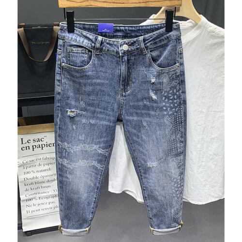 Denim Jeans mens Hong Kong style personality hole printing tide broken spring 2021 new cropped teenager pencil trousers