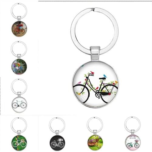 Vintage bicycle and flower basket picture glass cabochon dome DIY bicycle keychain, suitable for love cyclists