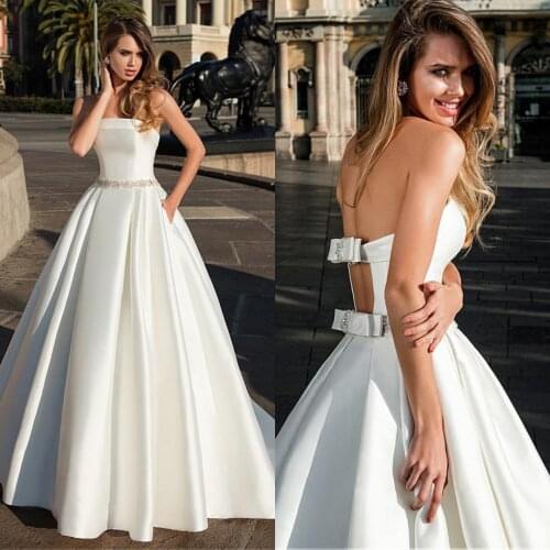 Delicate Satin Stapless Neckline A-line Wedding Dress Beadings Pockets Chic Back with Bow Custom Made Dresses Vestidos de novia