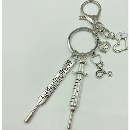 2021Hot Sale Nurse Medical Box Medical Keychain Syringe Stethoscope Love Cute Keychain White Dripping Oil Nurse Hat Jewelry Gift