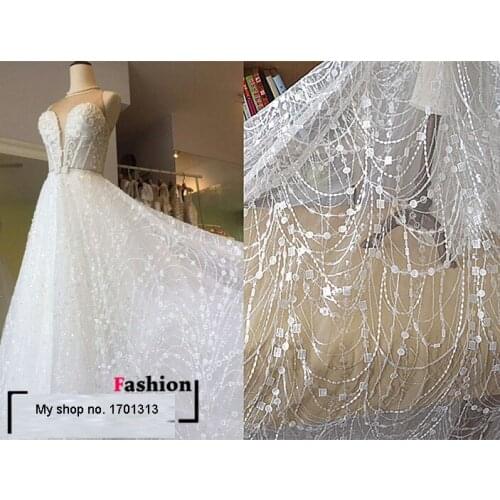 Top White French African Lace Fabric for Wedding dress Embroidery sequins flowers Lace fabric fish tail Slim white Lace fabric