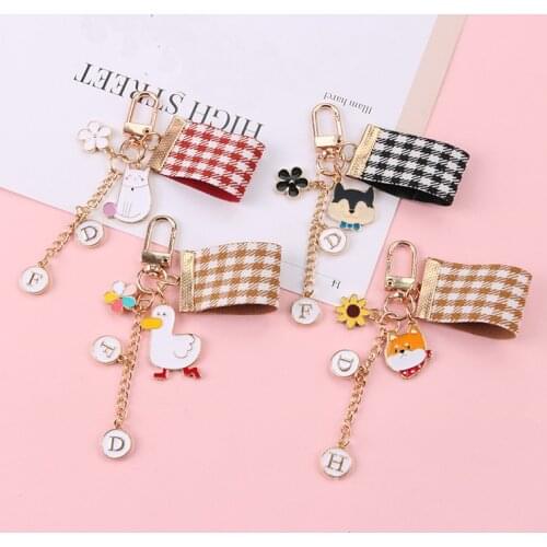 New Cartoon Cute Duck Cat Keychain Fashion Flowers Lattice Ribbon Key Ring Bag Accessories Pendant Girls Backpack Trinkets Gifts