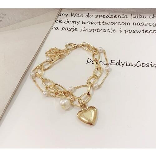 LAU CHIY Golden Bracelets