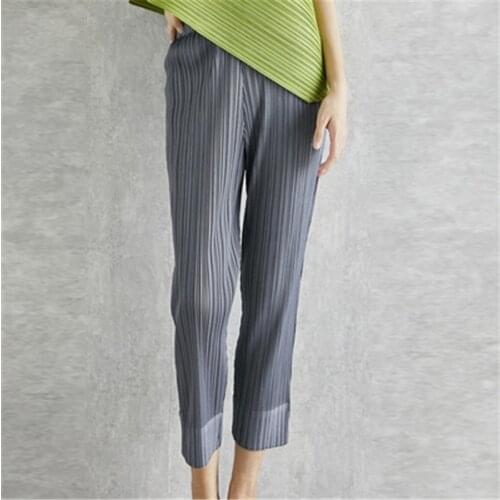 Miyake folds fashion new cropped trousers, solid color, large size, slim fit, urban casual pants, split pants, womens pants