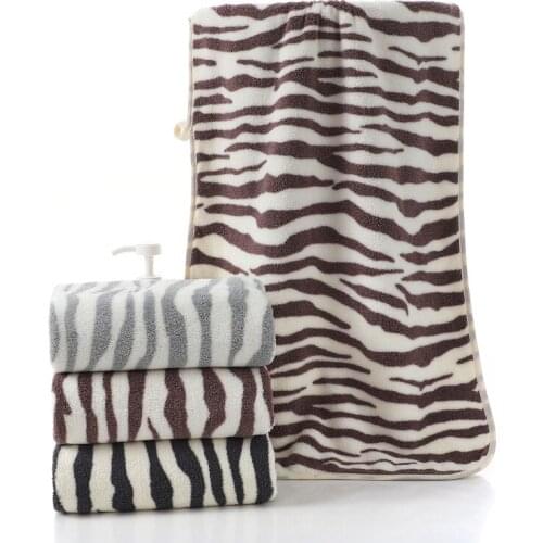 Two piece zebra striped towel and bath towel set coral fleece material stylish plain weave single yarn craft