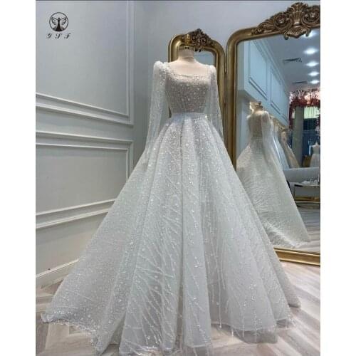 Elegant Wedding Dresses Illusion O Neck Beaded Stones Heavily Lace Puffy Long Sleeve Robe De Mariee