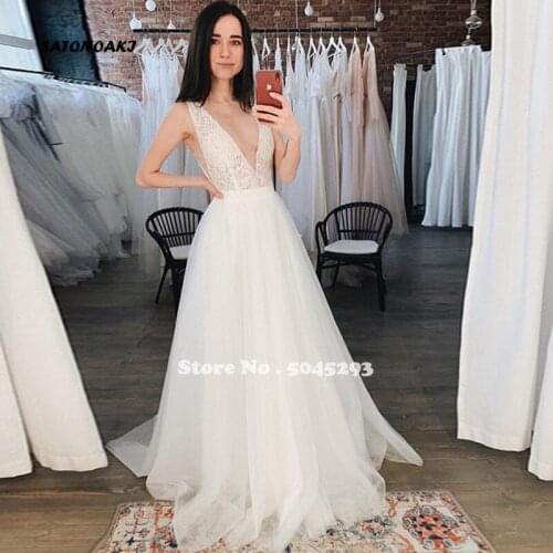 Sexy Beach V-Neck Wedding Dress 2020 Illusion Lace Skirt Vestido De Novia Sweep Train Backless Bridal Robe Mariage Online Shop