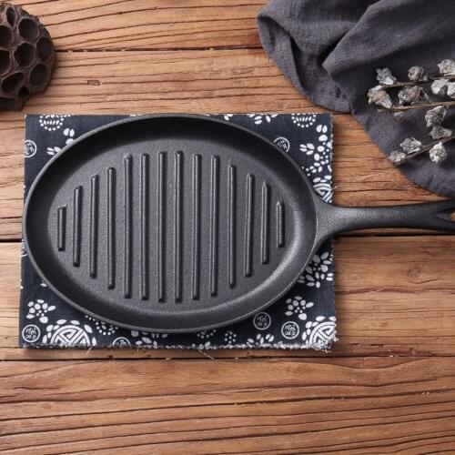 Elliptical mini stripe special steak frying pan cast iron hosehold steak frying pan uncoated non-sticking outdoor roasting pot