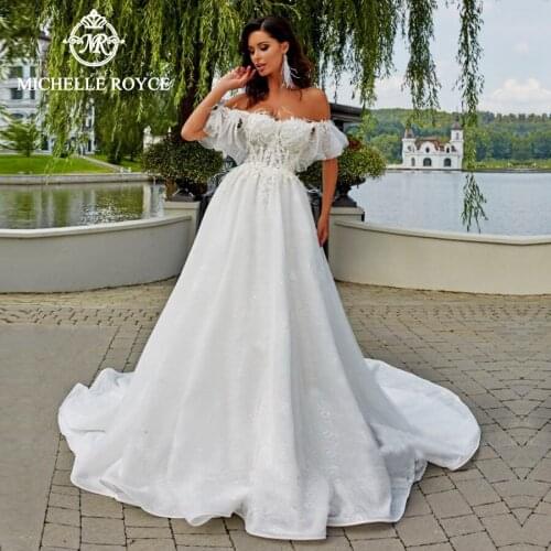 Michelle Royce A-Ling Wedding Dresses 2020 Sexy Sweetheart Appliques Lace Up Feathers Chapel Train Bridal Gowns Vestido De Noiva