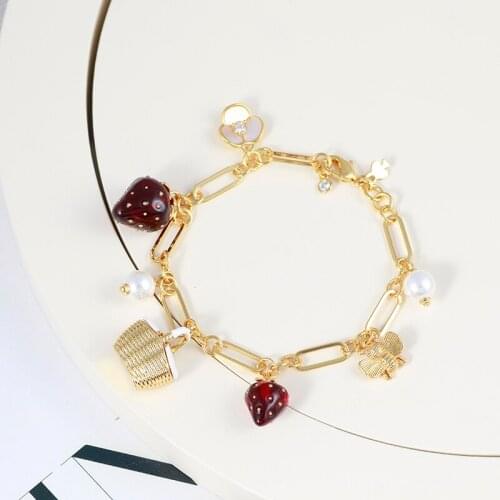 Fashion brand ins new resin strawberry pearl flower basket flower bee fresh and sweet multi-drop bracelet temperament